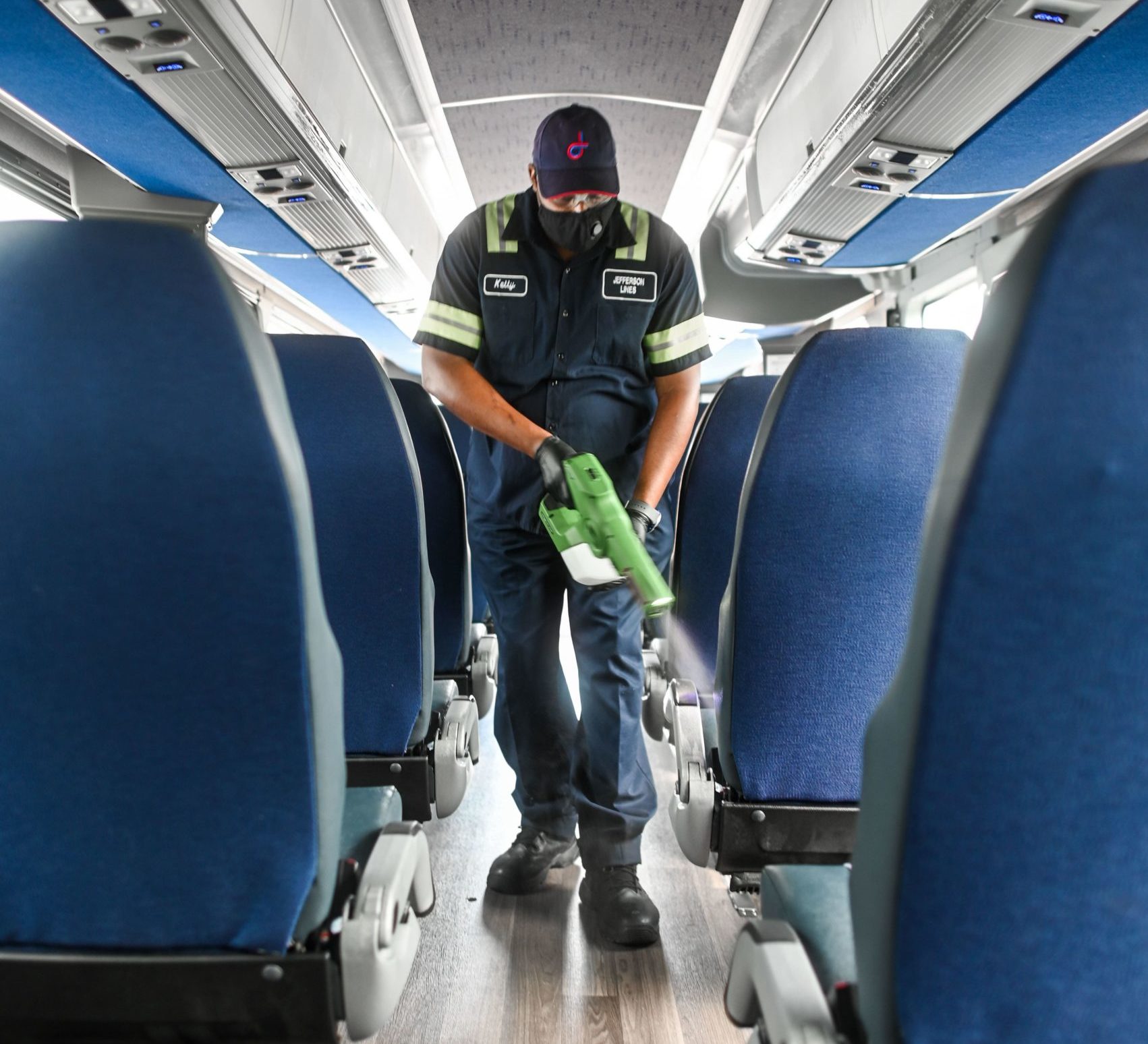 Jefferson Lines Bus Cleaner Spraying Bus with Electrostatic Disinfectant Sprayer