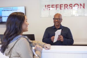 Passenger getting ticket at Jefferson Lines.